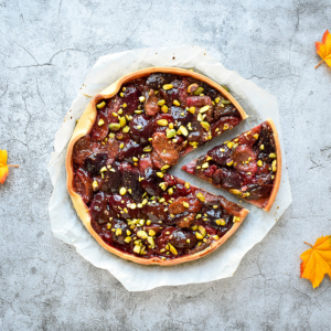 Plum fig pistachio tart